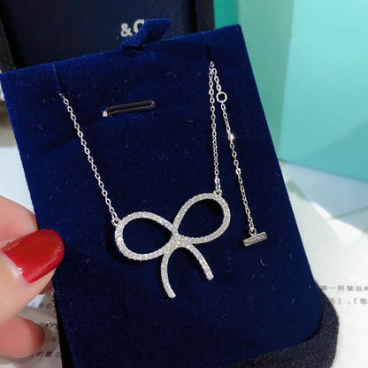 [Spark Jewels]CLAW SET RHODIUM PLATED BOW NECKLACE